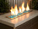Load image into Gallery viewer, American Fire Products 1/2 inch Azuria reflective fire glass used in outdoor fire pit creating blue flame reflections