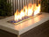 Load image into Gallery viewer, American Fire Products 1/2 inch Cobalt reflective fire glass used in outdoor fire pit with vibrant flame reflection