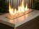 Load image into Gallery viewer, American Fire Products 1/4 inch Champagne reflective fire glass used in an outdoor fire pit creating a warm golden flame display