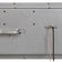 Load image into Gallery viewer, American Fire Products low capacity stainless steel linear drop-in fire pit pan CSA certified system showing back panel detail with compact electric ignition control, gas valve assembly, and connection components for small outdoor fire features