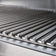Load image into Gallery viewer, Close-up of a Blaze LBM 25-Inch 3-Burner Freestanding Gas Grill in Stainless Steel with Cart grate on a barbecue