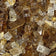 Load image into Gallery viewer, Close up of 1/2 inch Zion Reflective Fire Glass showing copper and gold reflective tempered glass pieces