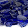Load image into Gallery viewer, Close up of Dark Blue Medium tempered fire pit glass showing deep blue reflective decorative glass pieces