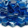 Load image into Gallery viewer, Close up of Pacific Blue Luster 2.0 Fire Glass Cubes showing bright blue color with a reflective luster finish