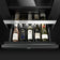 Load image into Gallery viewer, Dometic DrawBar 5C compact wine cooler with clear glass drawer front, built-in under cabinet design storing five wine bottles with LED lighting