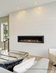 Load image into Gallery viewer, Empire Boulevard 60-inch direct vent linear gas fireplace with black porcelain liner and clear frost crushed glass