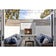 Load image into Gallery viewer, Majestic Courtyard 36 inch traditional outdoor vent-free natural gas fireplace with stacked concrete refractory interior and IntelliFire ignition system, stainless steel pull screens, clean face and flush hearth design