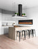 Load image into Gallery viewer, Napoleon Entice 60-inch linear electric fireplace installed on the wall of a modern kitchen