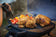 Load image into Gallery viewer, Two roasted chickens and vegetables cooking on the Napoleon TravelQ 285 portable gas grill