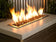 Load image into Gallery viewer, Outdoor fire pit filled with 1/2 inch Copper Fire Glass producing warm flames and elegant decorative appeal
