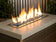 Load image into Gallery viewer, Outdoor fire pit filled with 1/2 inch Pacific Blue Fire Glass producing vibrant flames and modern decorative appeal