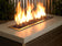 Load image into Gallery viewer, Outdoor fire pit filled with Dark Blue Medium fire pit glass producing vibrant flames and a modern decorative appearance