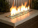 Load image into Gallery viewer, Outdoor fireplace featuring Aqua Blue Luster fire beads with vibrant blue glass enhancing flame display and ambiance