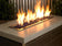 Load image into Gallery viewer, Outdoor fireplace featuring Royal Blue Luster fire beads enhancing flame color and creating a premium decorative fire display