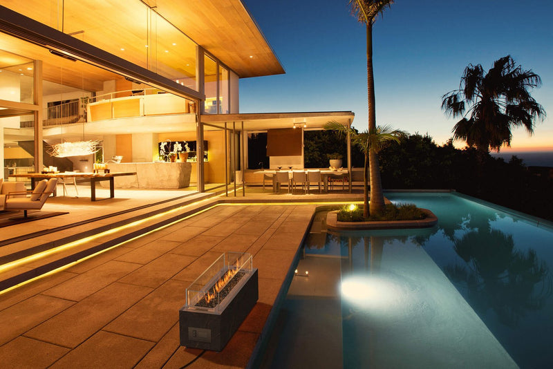 Load image into Gallery viewer, Planika Galaxy Laurent outdoor gas fireplace installed on luxury outdoor patio