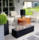 Load image into Gallery viewer, Planika Galio Black freestanding outdoor gas fireplace installed on modern patio