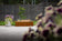 Load image into Gallery viewer, Planika Galio Corten Manual freestanding outdoor gas fireplace installed on modern patio