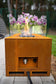 Load image into Gallery viewer, Planika Galio Corten Manual freestanding outdoor gas fireplace installed on modern patio