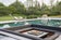 Load image into Gallery viewer, Planika Galio H Insert Automatic outdoor gas burner on a luxury patio at night
