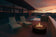 Load image into Gallery viewer, Planika Galio Star Black Outdoor Gas Fireplace in Modern Backyard Patio Lifestyle Setting