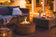 Load image into Gallery viewer, Planika Galio Star Corten outdoor gas fireplace installed on luxury patio with multidimensional flames
