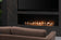 Load image into Gallery viewer, Modern living room with Planika NEX Media Wall sliding TV mechanism and integrated fireplace system