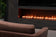 Load image into Gallery viewer, Modern living room with Planika NEX Media Wall sliding TV mechanism and integrated fireplace system