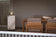 Load image into Gallery viewer, Planika Porto Daze freestanding fireplace used in a modern outdoor lounge area