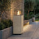 Load image into Gallery viewer, Planika Porto Nacre freestanding fireplace used in a modern outdoor lounge area