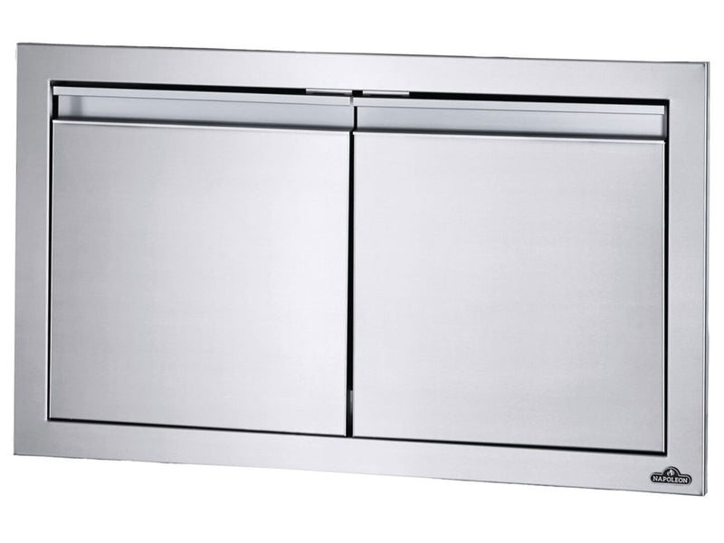 Load image into Gallery viewer, Napoleon 30-Inch Stainless Steel Small Double Doors for outdoor kitchens with soft-closing hardware, anodized aluminum handles, and seamless trim.
