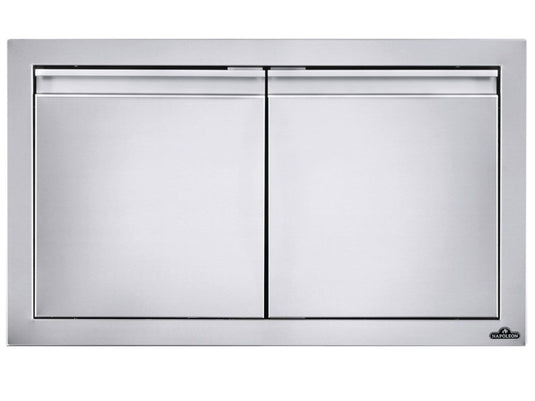 Napoleon 30-Inch Stainless Steel Small Double Doors for outdoor kitchens with soft-closing hardware, anodized aluminum handles, and seamless trim.