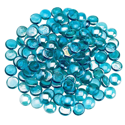 American Fire Products Aqua Blue Luster fire beads glowing in fire pit with bright flames reflecting off blue glass surface