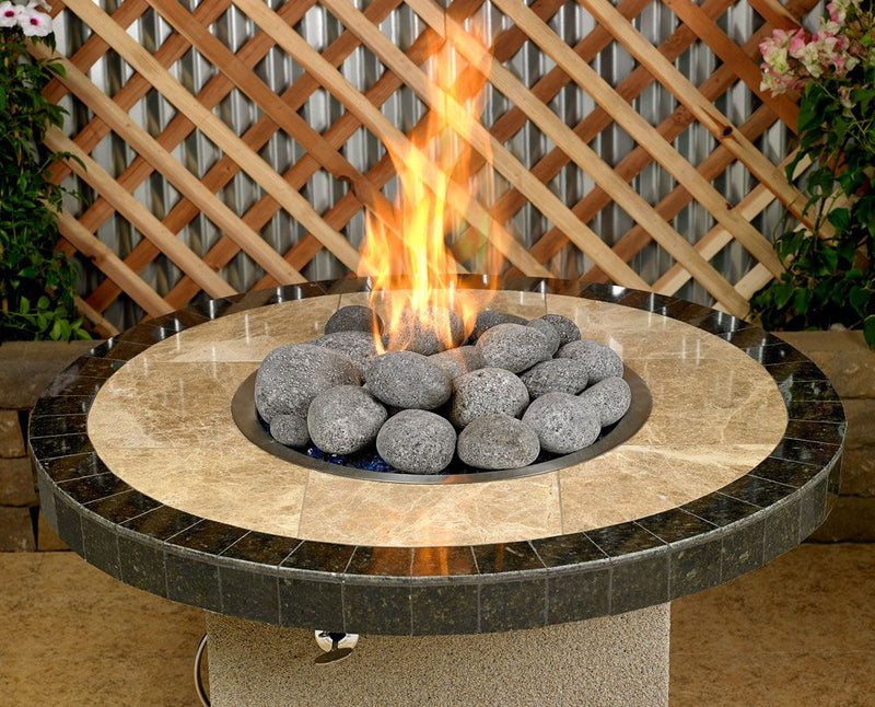 Load image into Gallery viewer, American Fire Products extra large gray tumbled lava stones 4 to 6 inch fire pit media use case showing volcanic rock as top layer decorative fire feature in gas fire pit with flames
