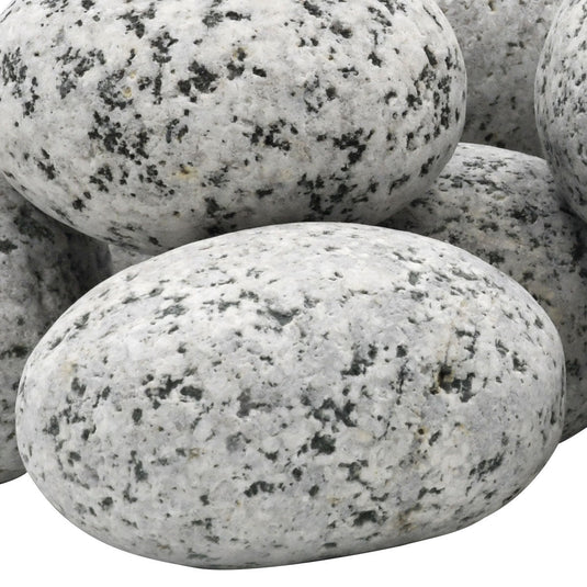 Close-up of American Fire Products large white tumbled element stone with natural white and black speckled finish