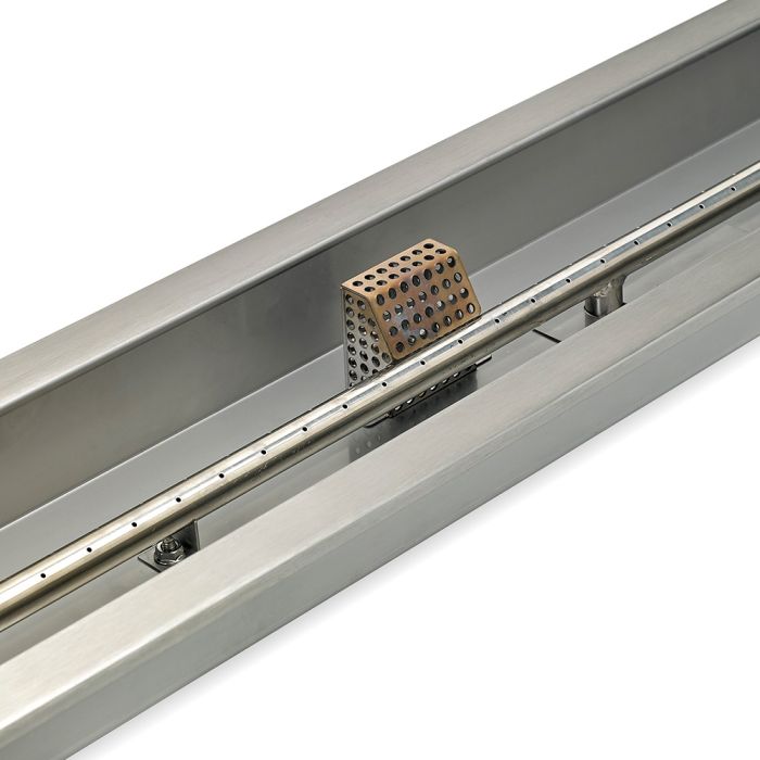 Load image into Gallery viewer, Close-up detail of stainless steel construction of linear burner pan showing brushed metal surface and burner slot design for fire pit use

