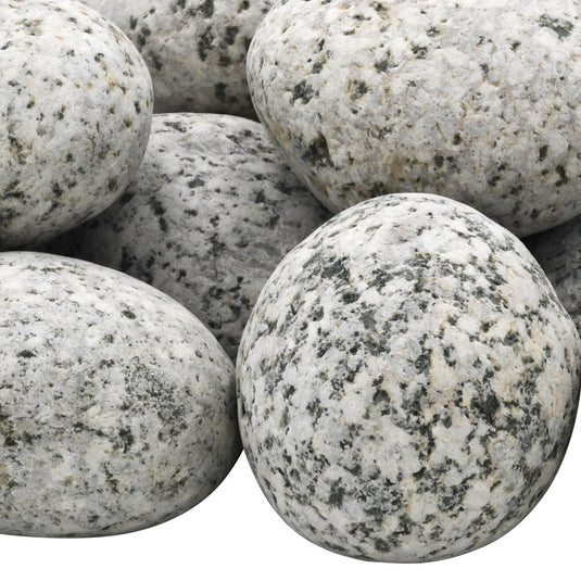 Close-up of American Fire Products medium white tumbled element stone with natural white and black speckled finish