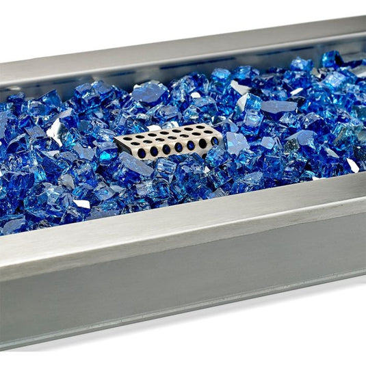 American Fire Products stainless steel linear drop-in fire pit pan CSA certified electric ignition system displaying fire glass media over linear burner for decorative outdoor gas fire feature