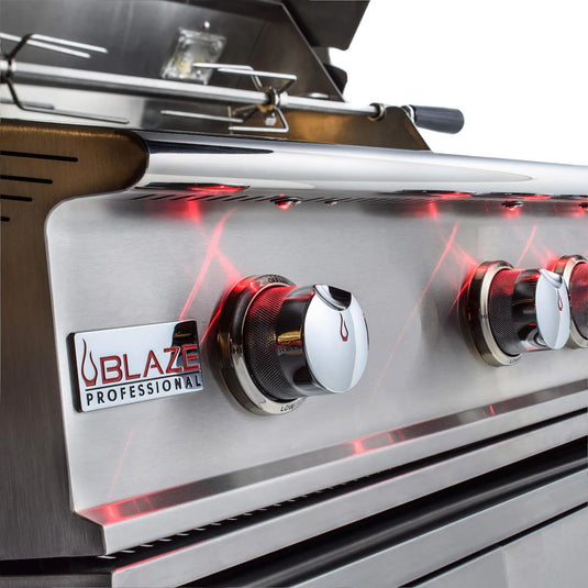 Stainless steel grill with Blaze Professional branding and red interior lights.