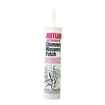 Chimney masonry patch with exterior mastic cement in natural concrete color for mortar repair