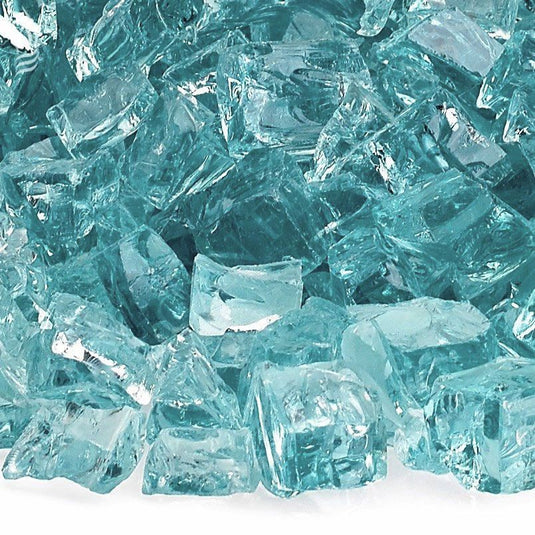 Close up of 1/2 inch Azuria Fire Glass showing Azuria blue tempered glass pieces with a brilliant finish