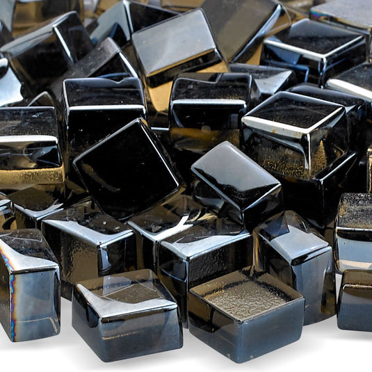 Close up of American Fire Products Bronze Luster 2.0 Fire Glass Cubes showing bronze tempered glass with a reflective luster finish
