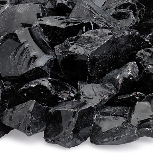 Close up of Onyx Medium tempered fire pit glass showing glossy black decorative glass pieces with reflective shine
