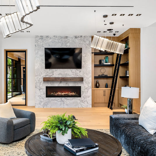Empire Boulevard 60-inch direct vent linear gas fireplace installed in a modern living room with logs and rocks