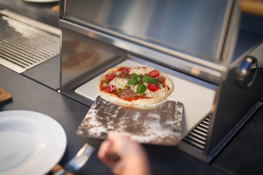 Pizza baking on the Festavolo Ceramic Pizza & Baking Stone