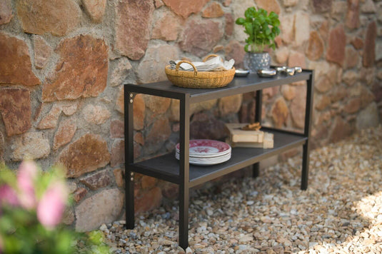 Festavolo FORTE sideboard used as a side table for serving food and drinks with a flowerpot