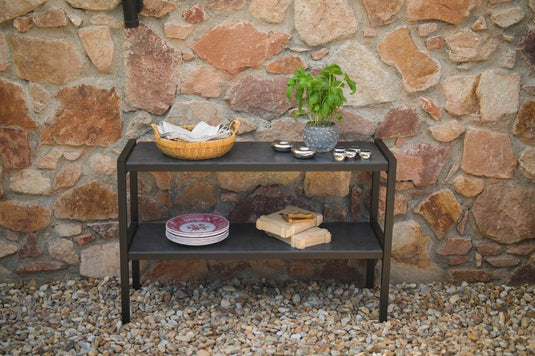 Festavolo FORTE sideboard used as a side table for serving food and drinks with a flowerpot