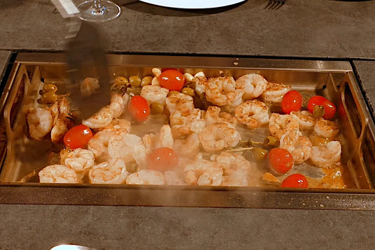 Festavolo Stainless Steel Plancha cooking shrimp on a grill unit