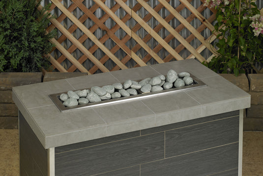 Fireplace linear lite stones in cape grey finish, modern ceramic fire media arranged in a linear gas fireplace design for indoor and outdoor fire features with a clean minimalist look.