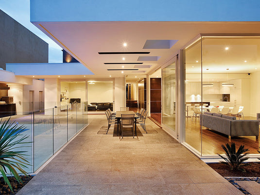 HEATSTRIP Classic electric heaters installed on the ceiling of a modern covered patio