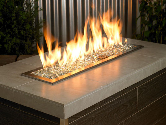 Indoor fireplace featuring glacier ice fire beads with glowing flames and modern decorative fire design